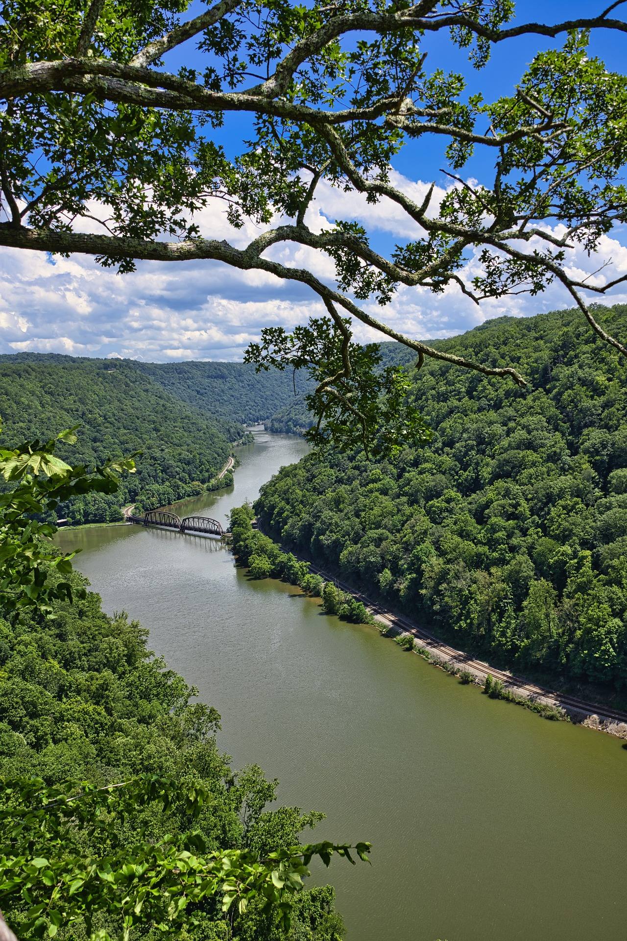 The view from the Hawks Nest overlook, looking down forested gorge walls to the New River below.